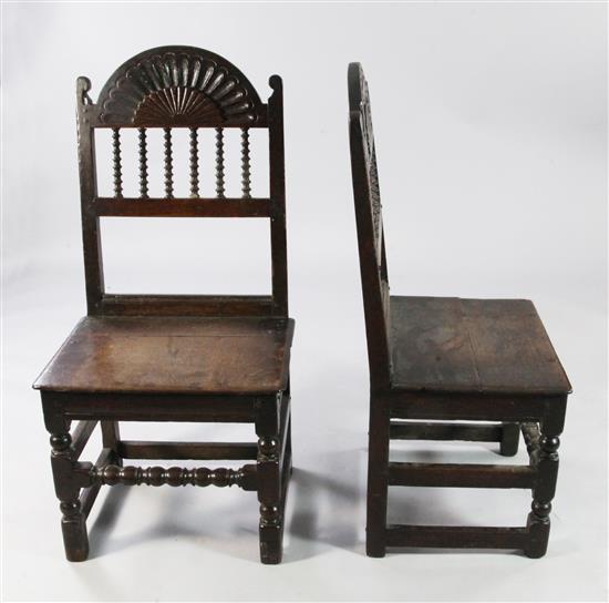 A pair of late 17th century North Cheshire / South Lancashire oak backstools,